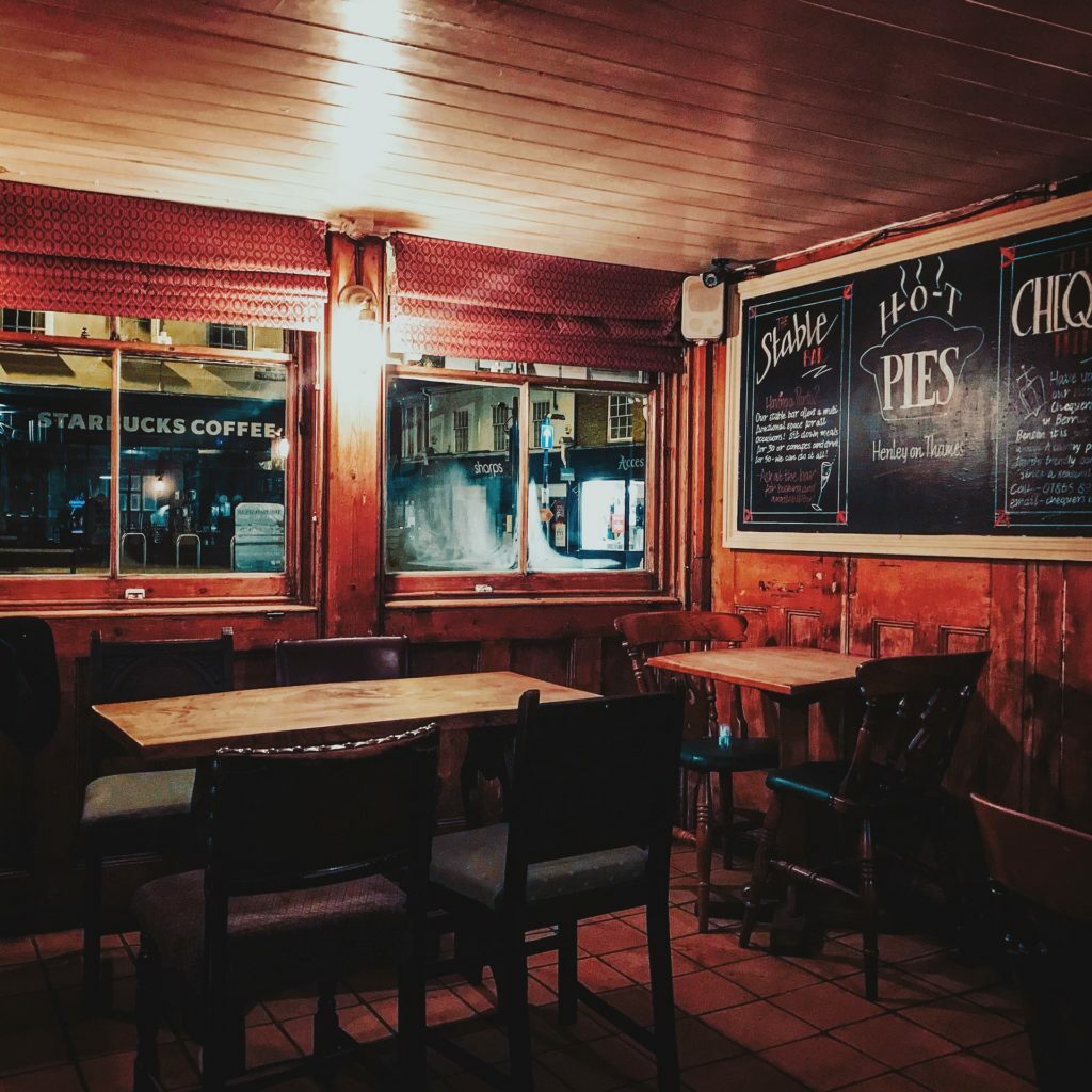 a restaurant with tables and chairs
